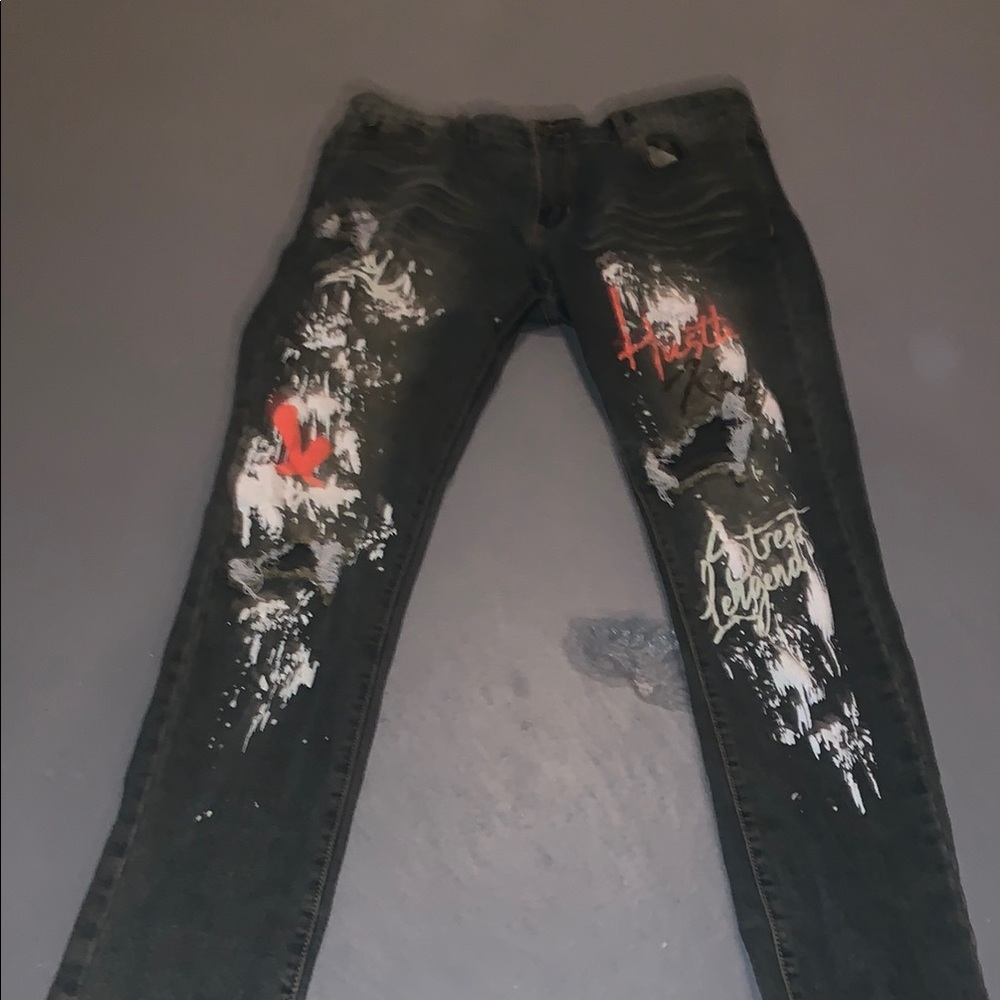 Distressed Black Jeans with Graphic Accents